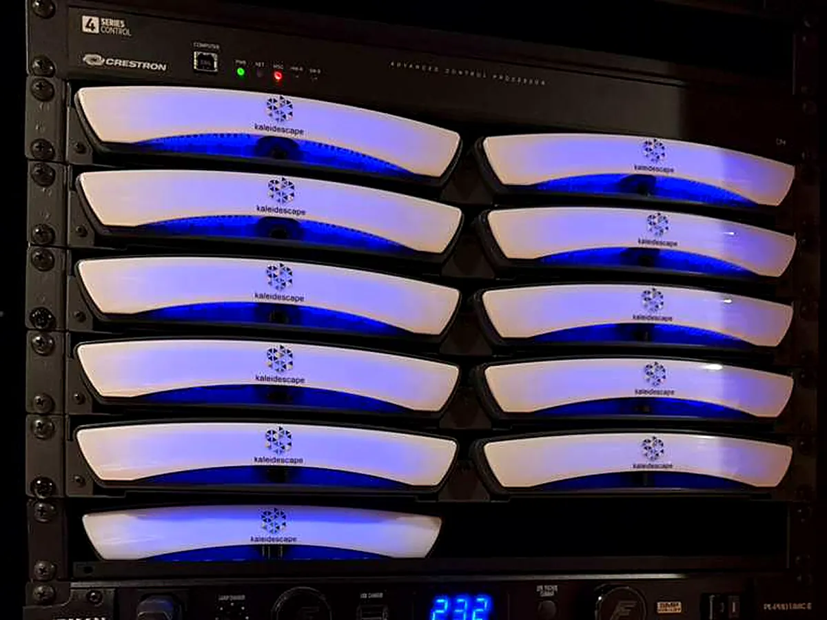 Home theater equipment rack — control processor and media servers, labeled and professionally wired to the same standard as a yacht bridge